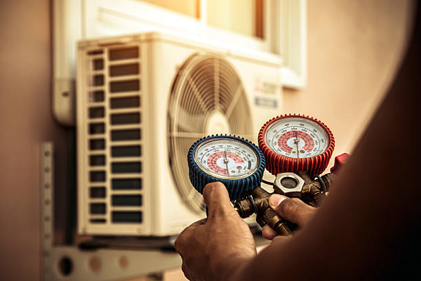 Professional Heat Pump Repair technician working in Gas City, IN